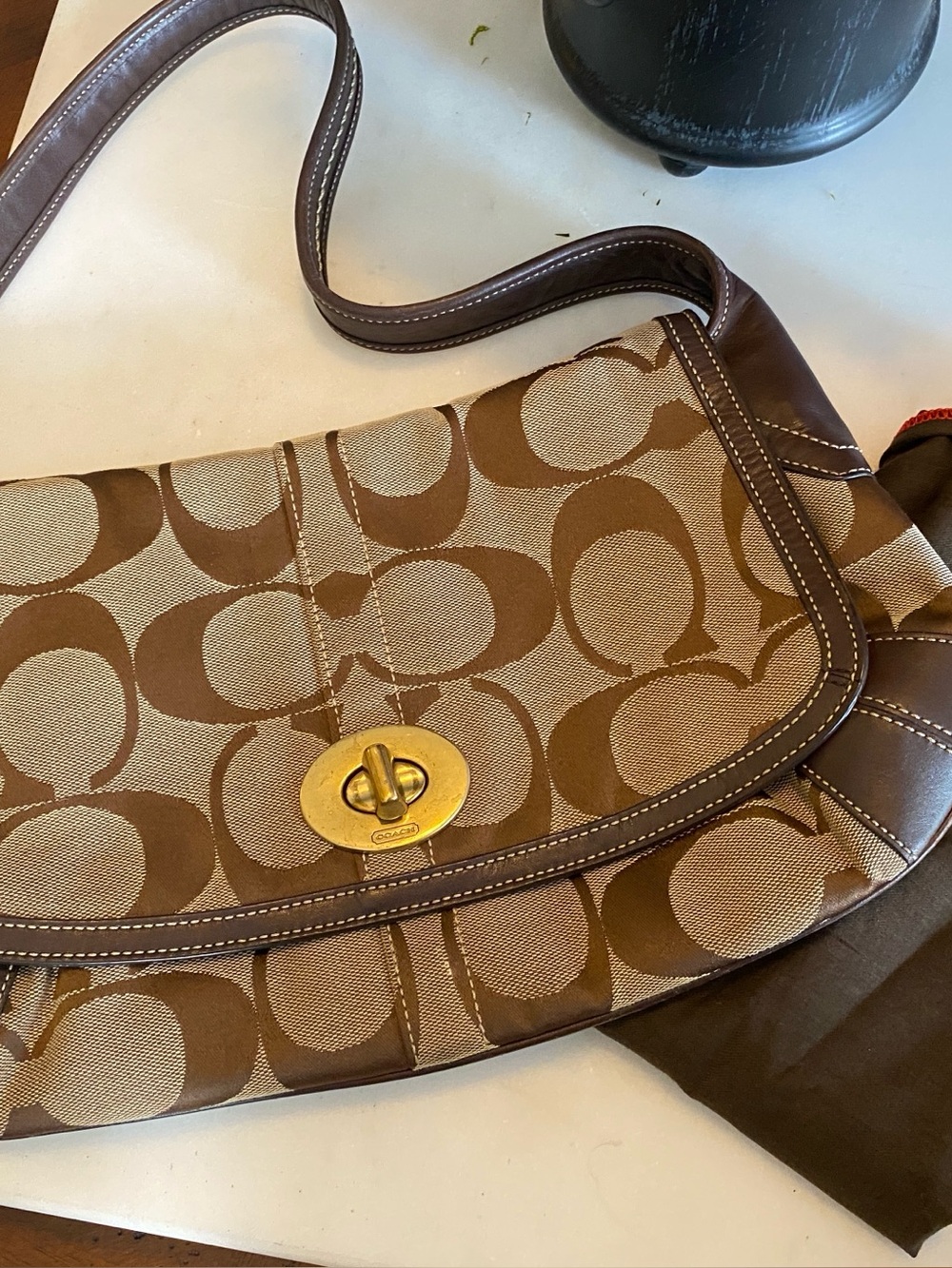 Coach Brown Signature Canvas Shoulder Bag with Gold Turnlock no hang tag.